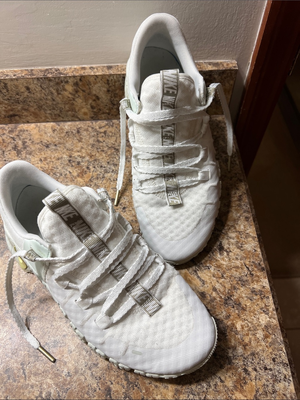 Nike White Low-Top Knit Trainers with Subtle Metallic Accents